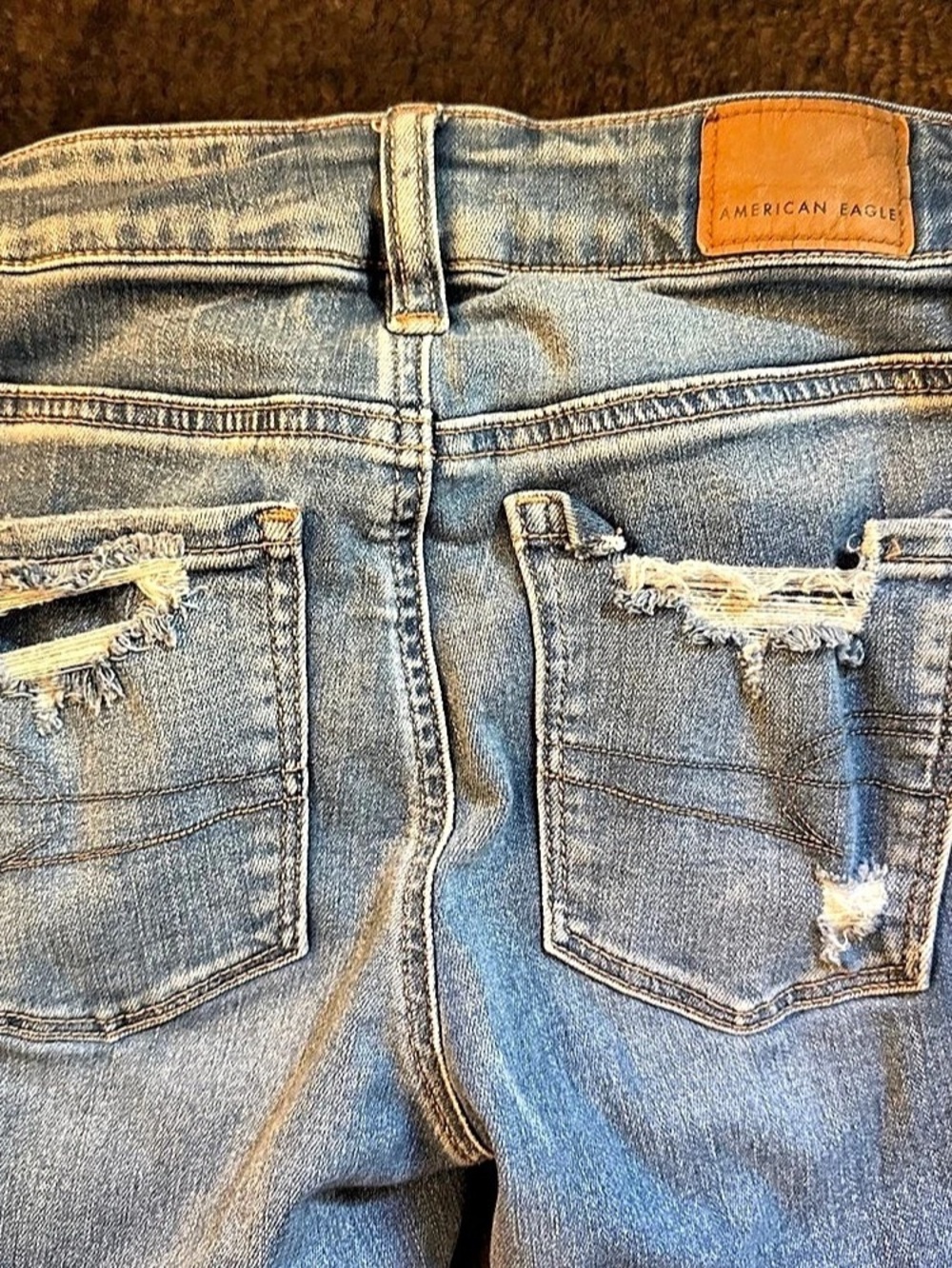 American Eagle Super Stretch Jegging Distressed Skinny Jeans in Blue Size 00S - Picture 3 of 5